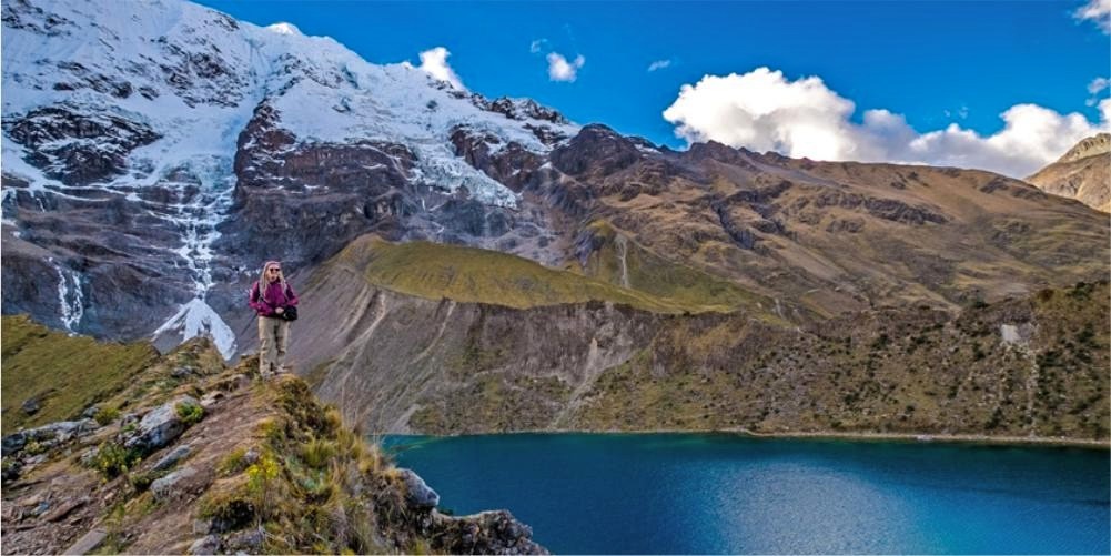 The famous Sky Camp in Soraypampa under the impressive humantay mountain lighted for the light of the starts. Stargazing in Peru.